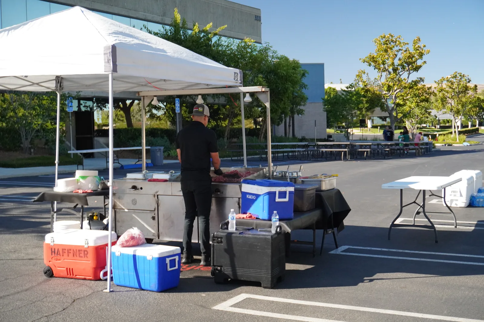 The catering setup in a parking lot before guests arrive