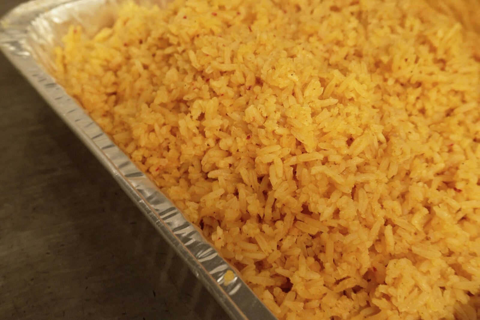 A full foil tray of Spanish rice in the B&C kitchen